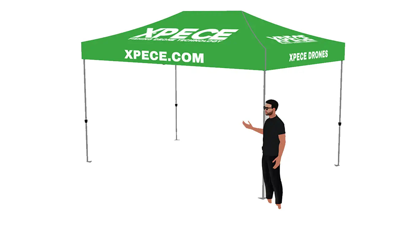 Angled right-side view of green XPECE 10x10 canopy tent showing XPECE.COM and XPECE DRONES branding with person for scale