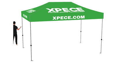Green XPECE 10x10 commercial grade beach tent canopy with XPECE.COM branding, front angle view.